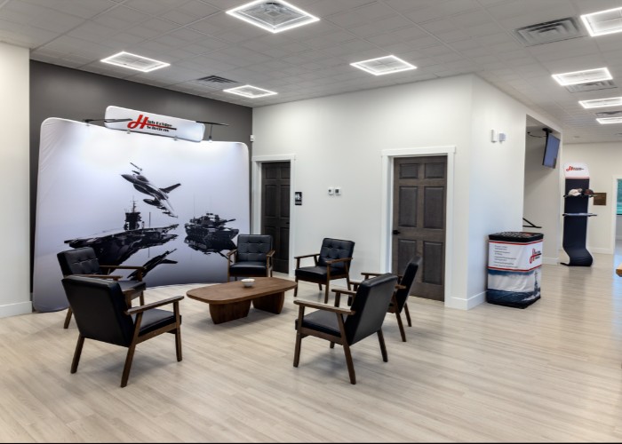 Modern reception lounge with aviation backdrop