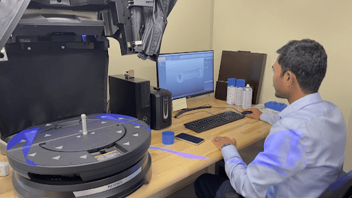 Lab technician using tabletop 3D scanner