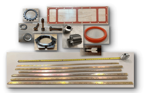 Assorted industrial metal parts and gaskets